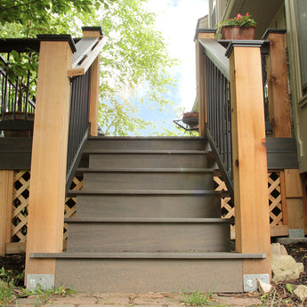 Composite deck steps with wood posts built by DW Elite Decks