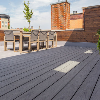 Rooftop deck built by Unique Deck Builders using Deckorators composite decking